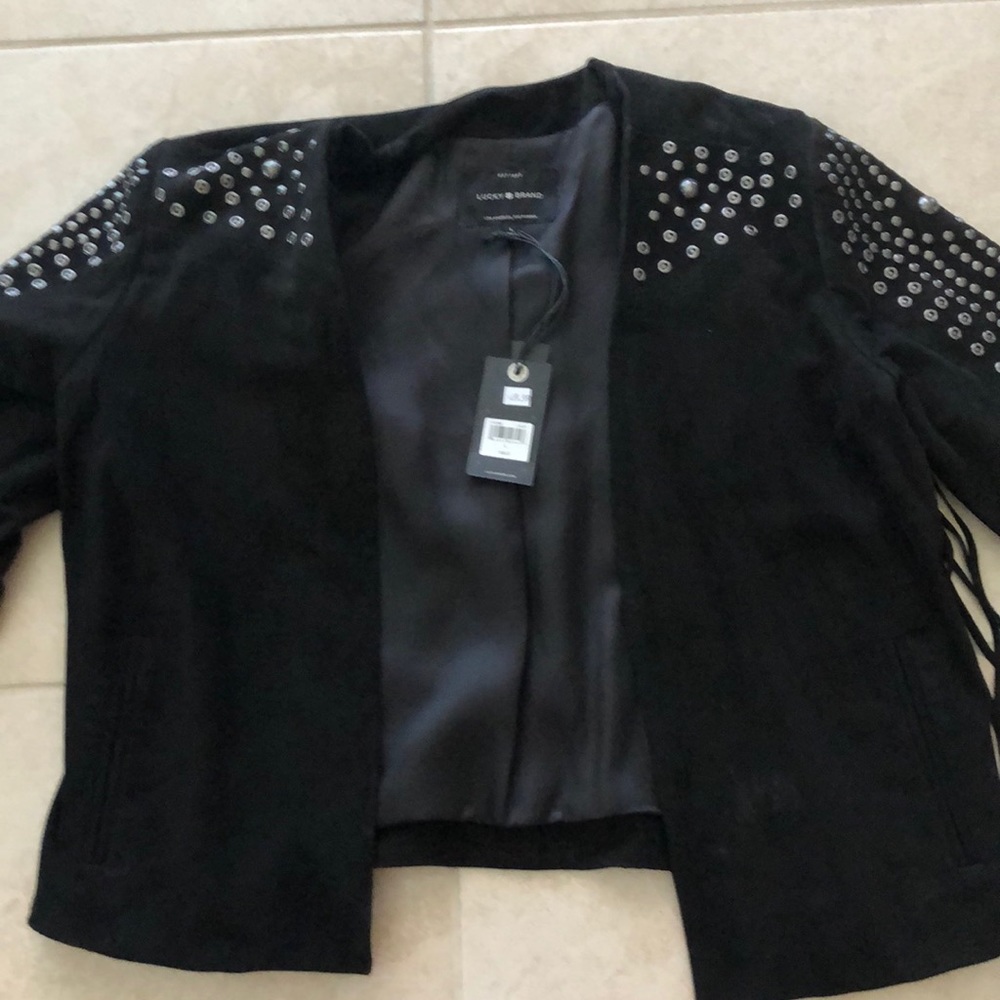 Studded, fringed suede jacket.